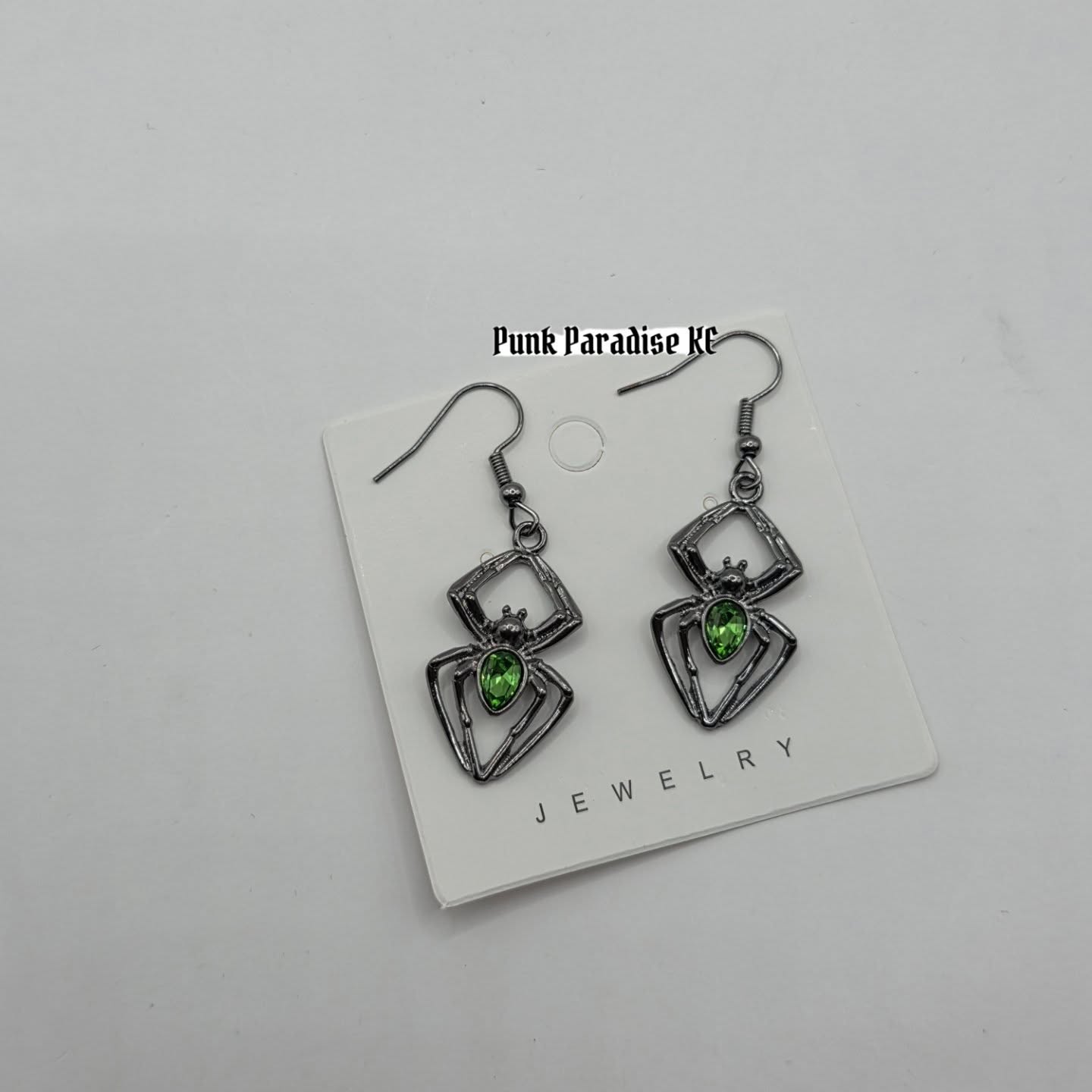 Grey green spider earrings